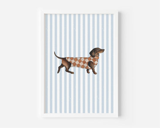 A framed art print featuring a brown dachshund wearing a brown and beige argyle sweater, set against a background of light blue and white vertical stripes.