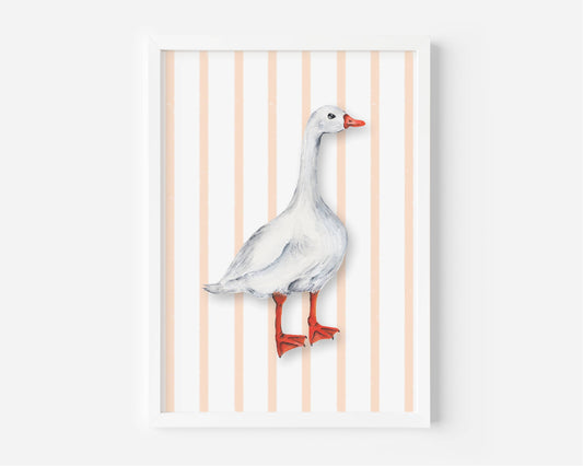 A framed art print featuring a watercolor-style white goose with orange-red beak and legs, standing against a background of vertical peach and white stripes.