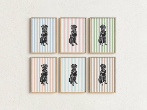 Six framed wall art prints arranged in two rows of three on a light textured wall. Each print shows a black dog illustration centered on pastel vertical stripes in different colors: light blue, pink, and sage green, with light wood frames.