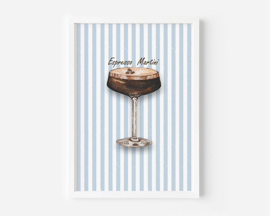 A framed art print featuring an illustration of an Espresso Martini cocktail against a light blue and white striped background, displayed on a clean white wall.