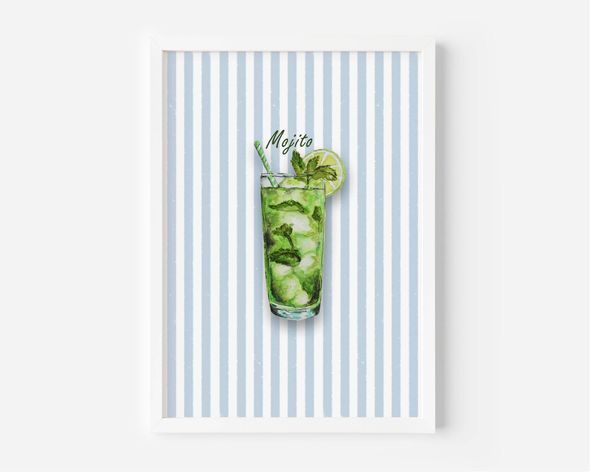 A framed art print featuring a watercolour illustration of a mojito cocktail in a tall glass with mint leaves, ice, a lime wheel and a striped straw, set against a background of vertical light blue and white stripes. The print is shown in a white frame.