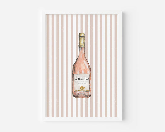 A framed art print featuring a watercolor illustration of a pink wine bottle centered on a background of vertical beige and white stripes.