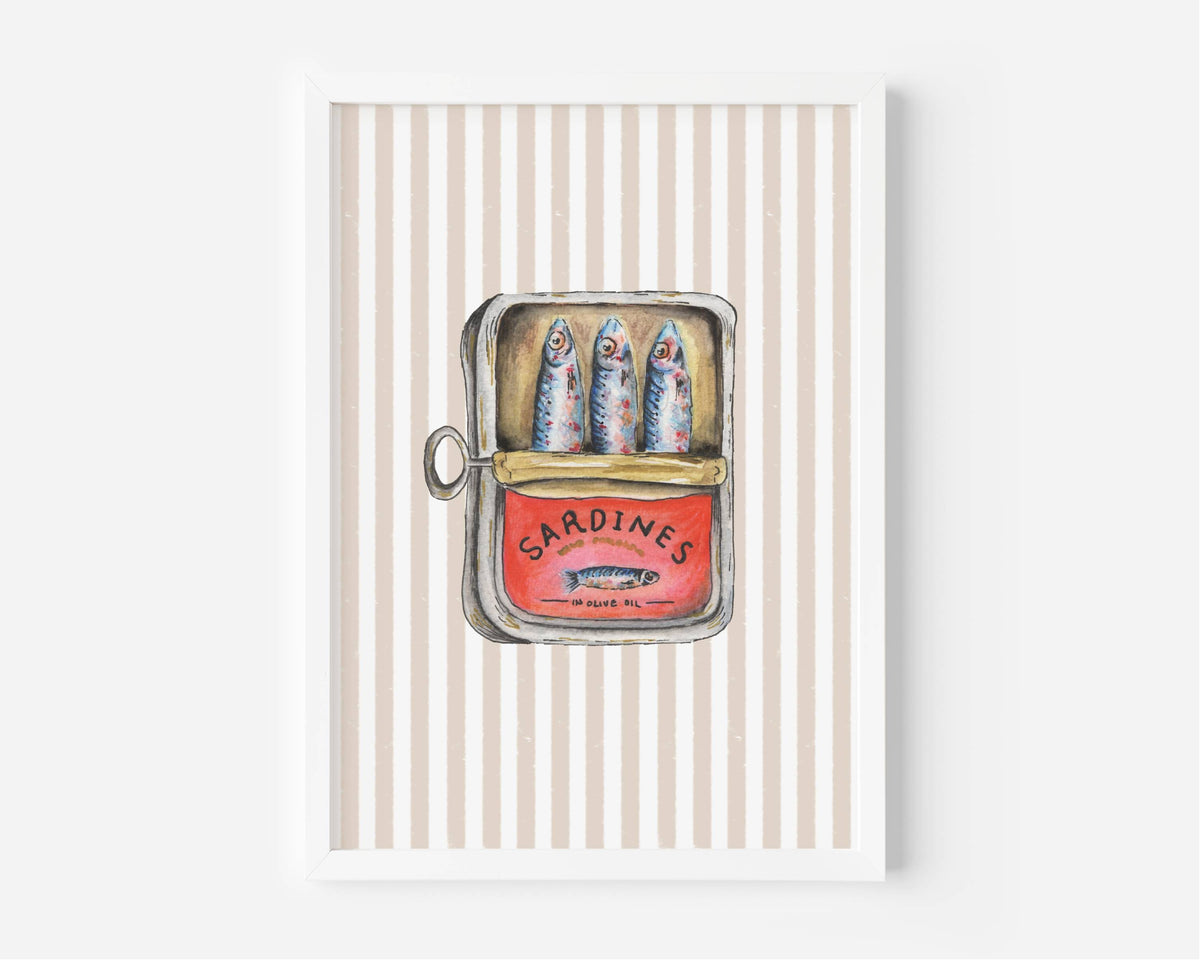 A framed art print featuring a whimsical illustration of an open sardine tin with three sardines, set against a background of vertical beige and white stripes.