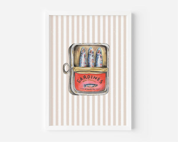 A framed art print featuring a whimsical illustration of an open sardine tin with three sardines, set against a background of vertical beige and white stripes.