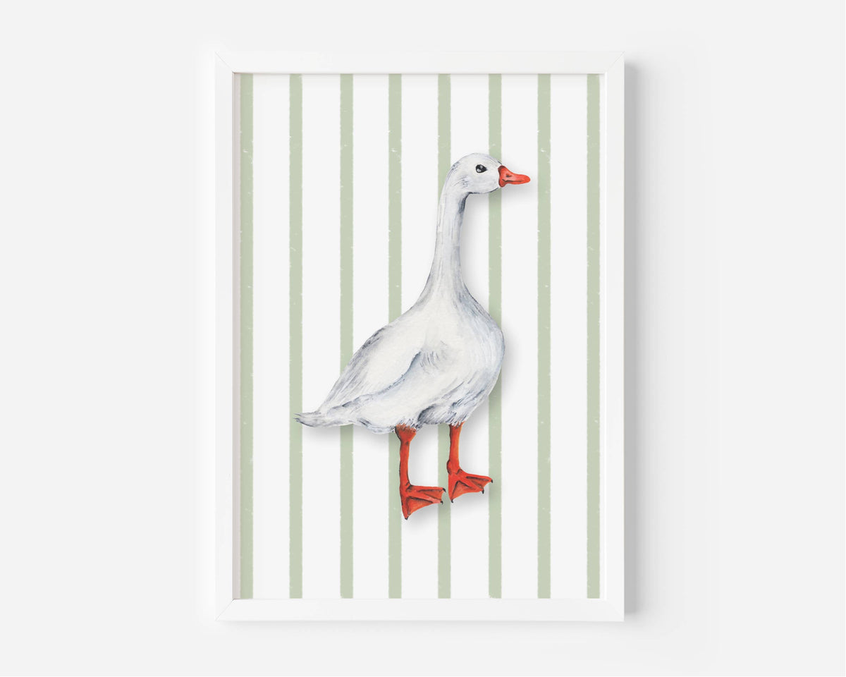 A framed art print featuring a watercolor-style white goose with red-orange beak and legs, standing against a background of vertical light green and white stripes.