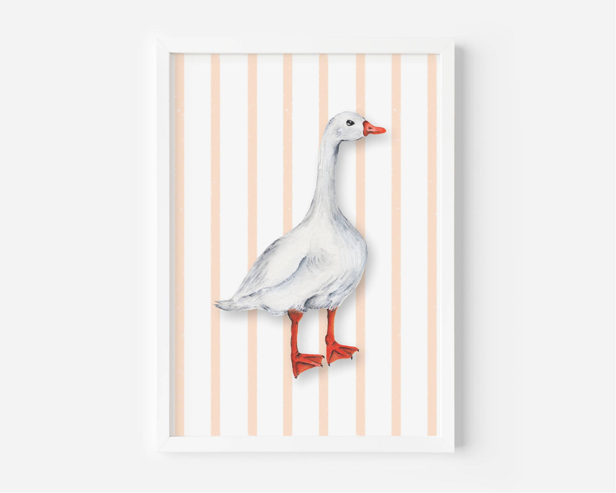 A framed art print featuring a watercolor-style white goose with orange-red beak and legs, standing against a background of vertical peach and white stripes.