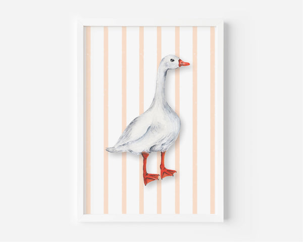 A framed art print featuring a watercolor-style white goose with orange-red beak and legs, standing against a background of vertical peach and white stripes.