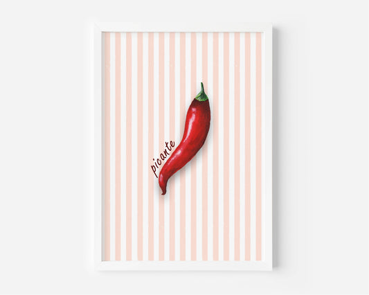 A framed art print featuring a single red chili pepper on a background of vertical peach and white stripes, with the word 'picante' written in cursive next to it.