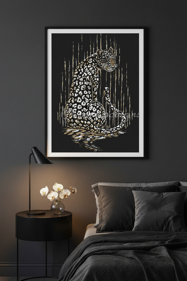 A framed art print of a leopard sitting in rain, featuring a black and white spotted pattern with gold rain streaks, displayed on a dark gray wall above a bed with dark gray bedding and a black bedside table.