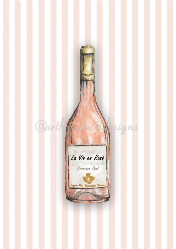 Watermarked - LA VIE EN ROSÉ Watercolour Art Print - Pink Stripe
A watercolour illustration of a rosé wine bottle centered on a pale pink and white vertically striped background. The bottle has a pinkish rosé tone, a gold foil top, and a cream label reading 'La Vie de Rose' and 'Provenée Rose.